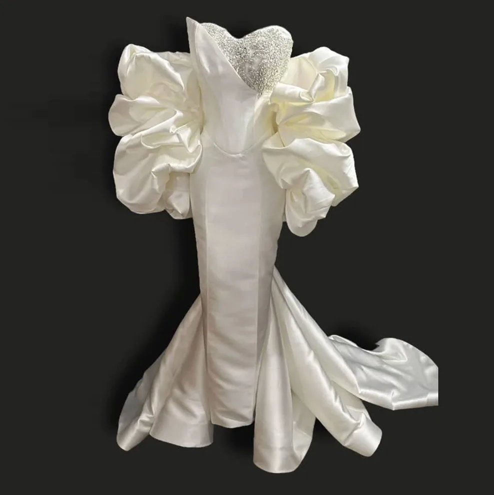 And She Is Couture® — custom luxury couture gowns and womenswear