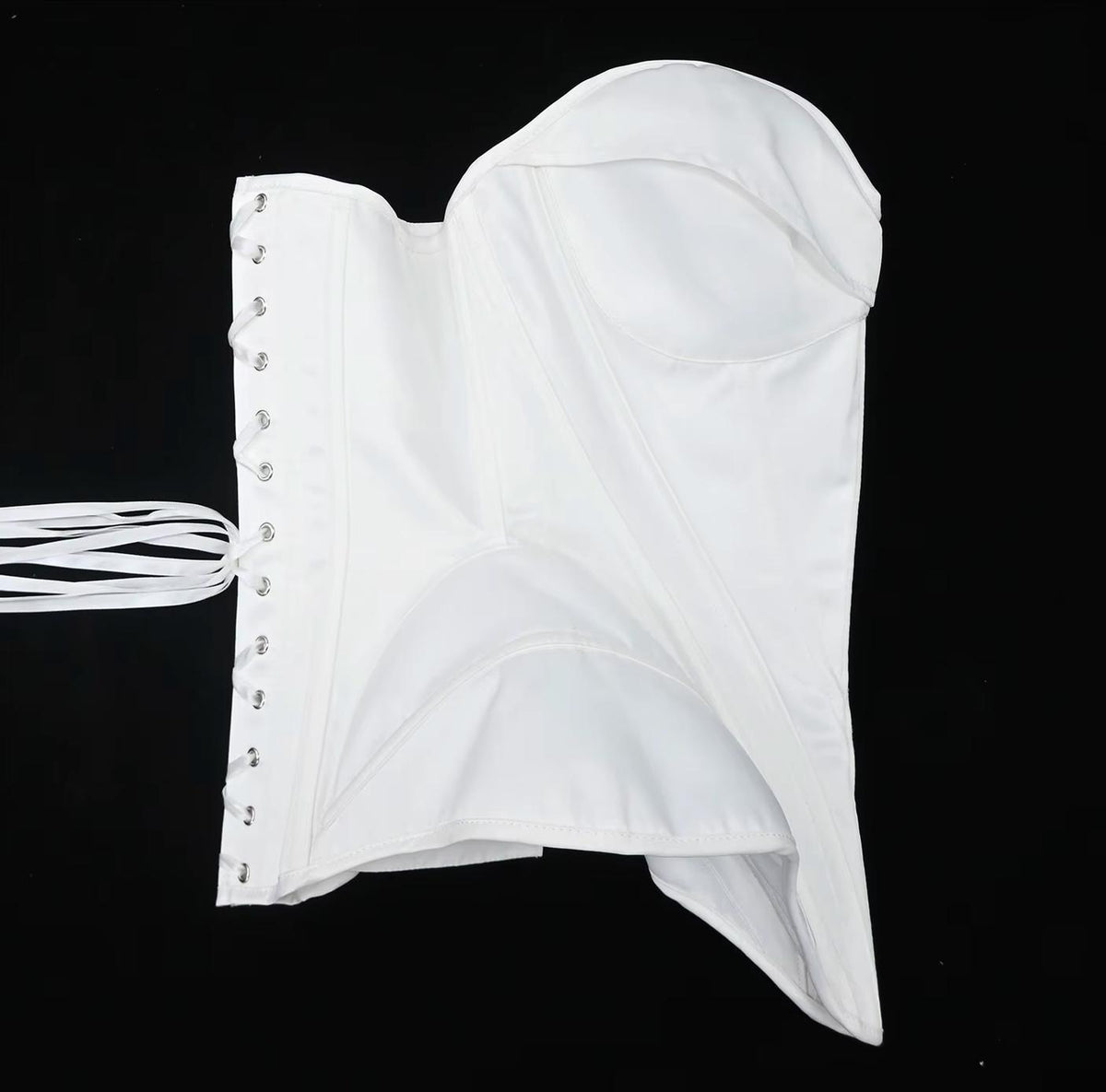 White satin bridal corset bustier featuring structured boning, a strapless design, and a classic lace-up back closure.
