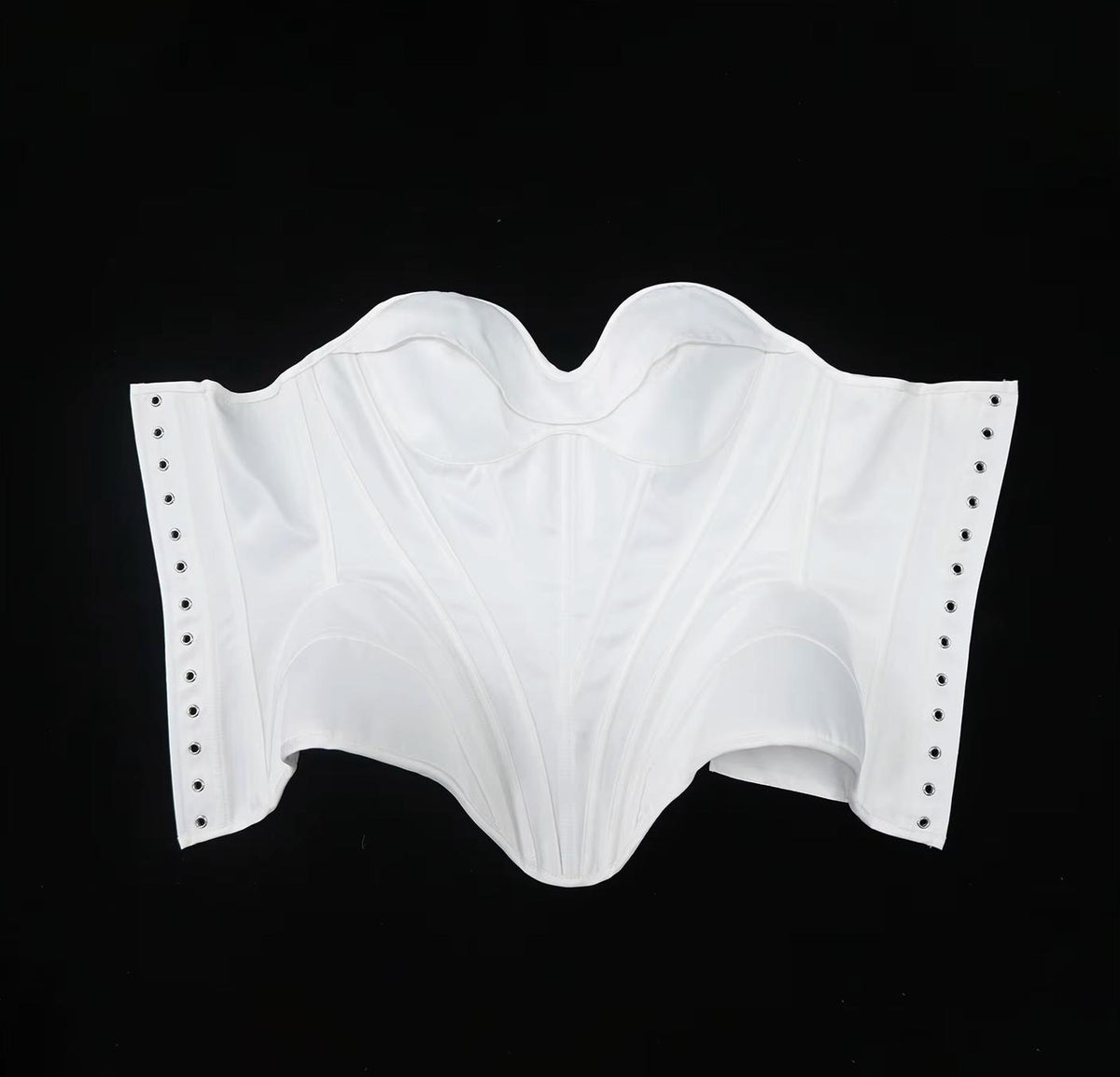 White satin bridal corset bustier featuring structured boning, a sweetheart neckline, and side lace-up grommet detailing.