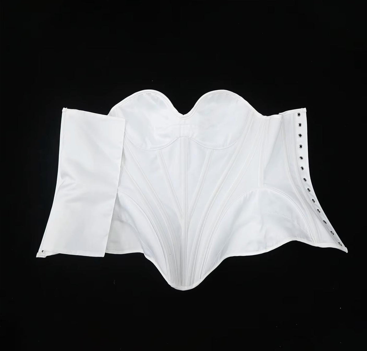 White satin bridal corset bustier with structured boning, sweetheart neckline, and side lace-up eyelet closure.