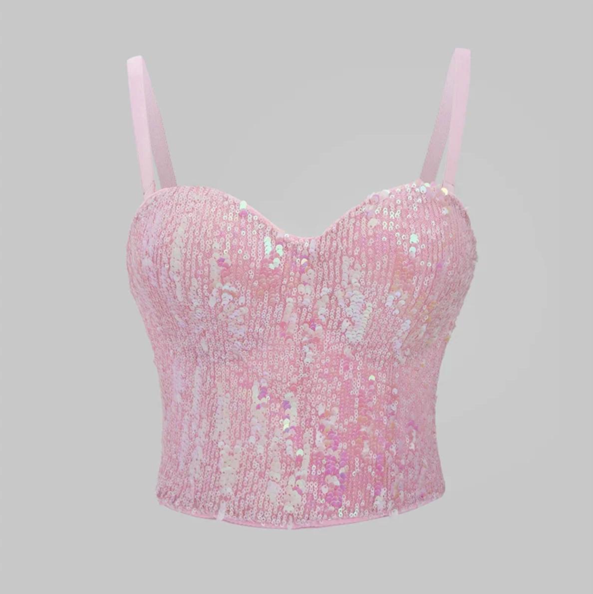 Pink sequin corset bustier top with a structured sweetheart neckline and adjustable spaghetti straps.
