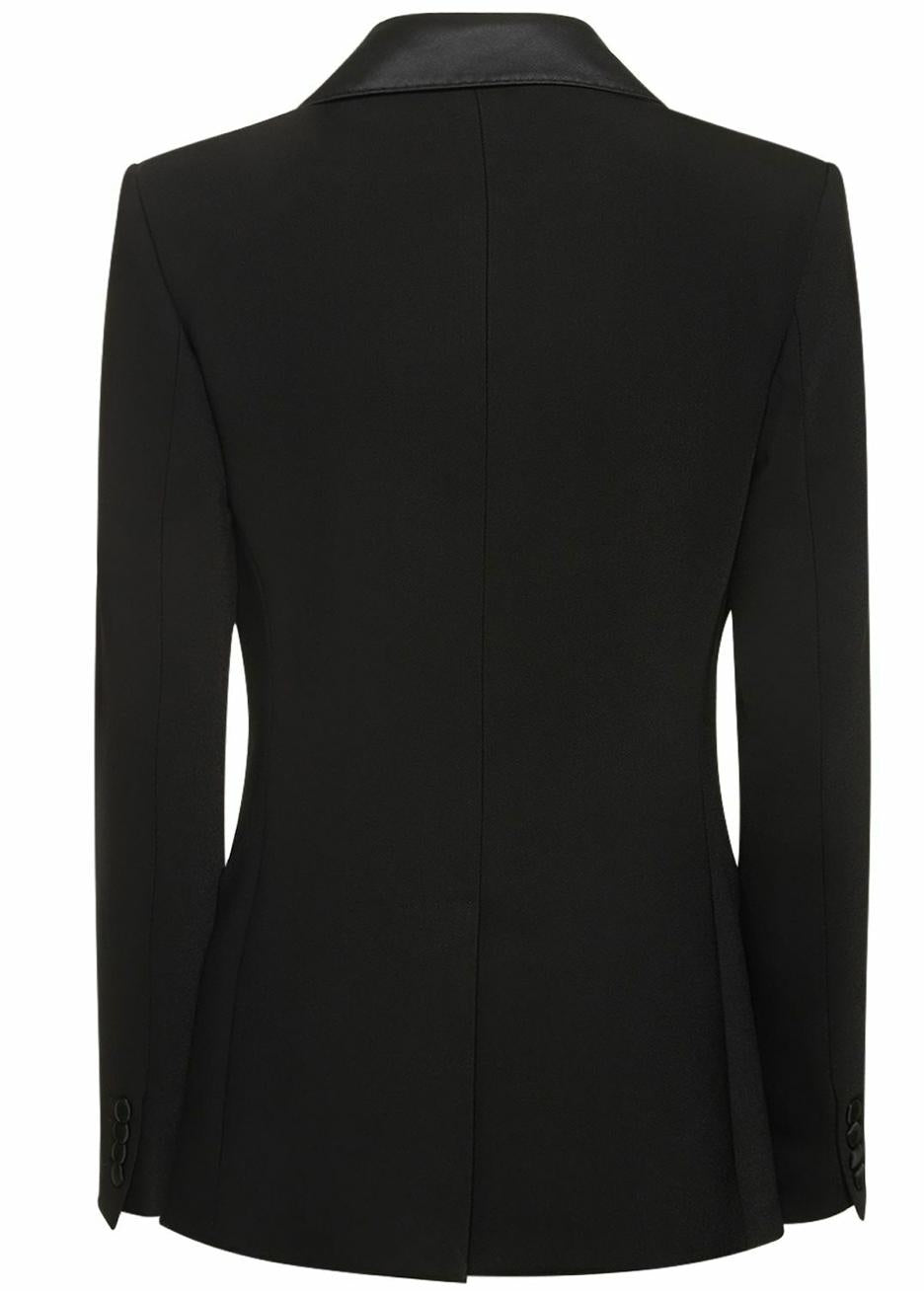 Back view of a black Brioni Vanqui suit jacket in stain-resistant twill with a sleek satin collar.