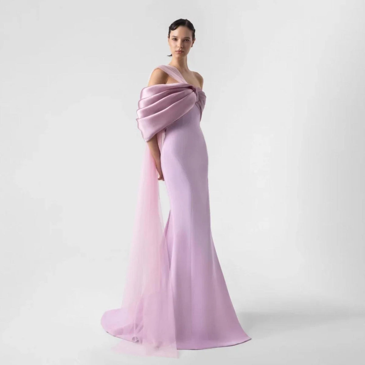 Lavender one-shoulder satin evening gown with draped organza detailing and a floor-length silhouette.