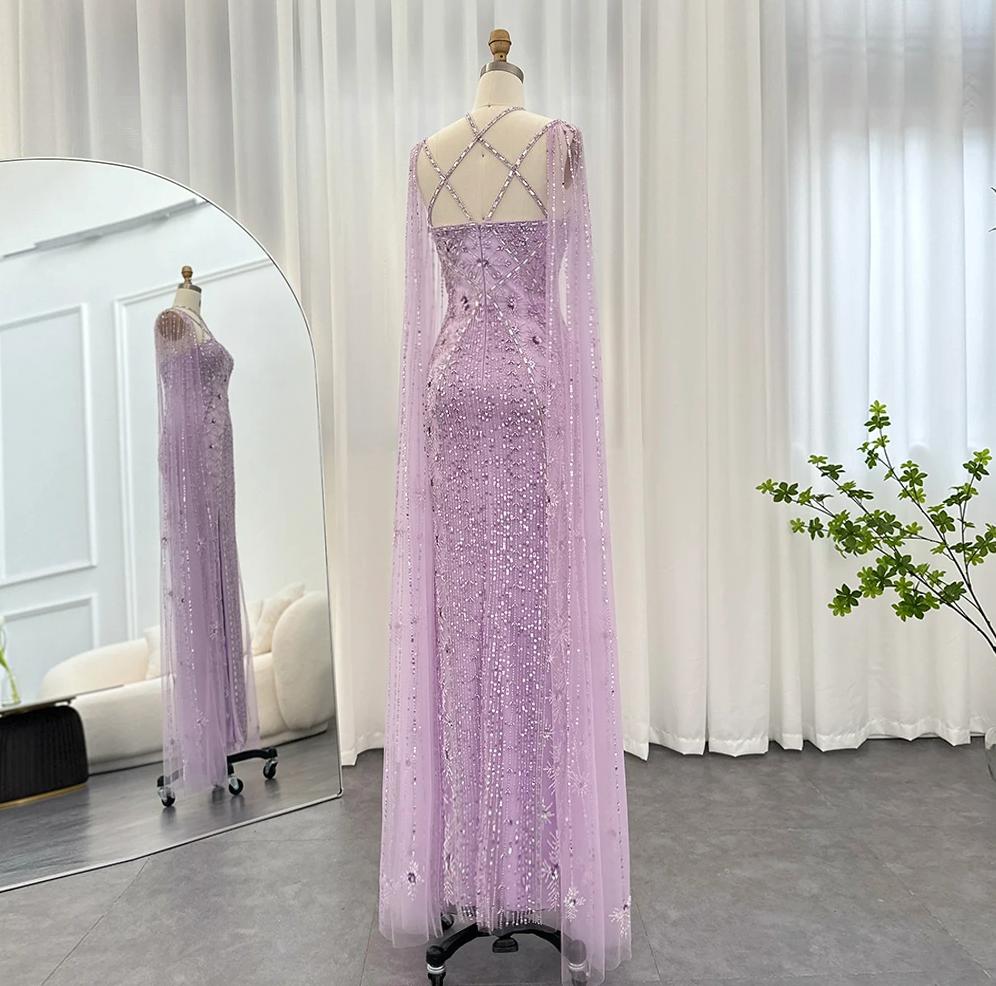 Lavender mermaid gown with cape sleeves, criss-cross back, and intricate crystal and sequin tulle embellishments.