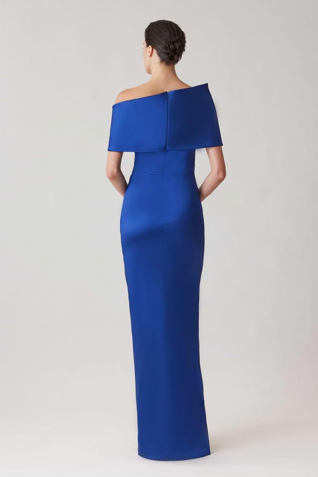 Royal blue stretch-mikado floor-length gown with an asymmetrical off-shoulder neckline and sculptural cuff.