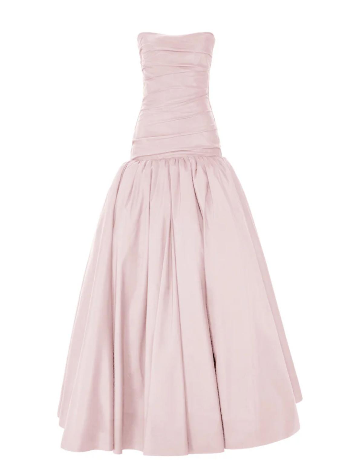 Strapless blush pink taffeta gown with a hand-draped bodice and a voluminous, structured floor-length skirt.