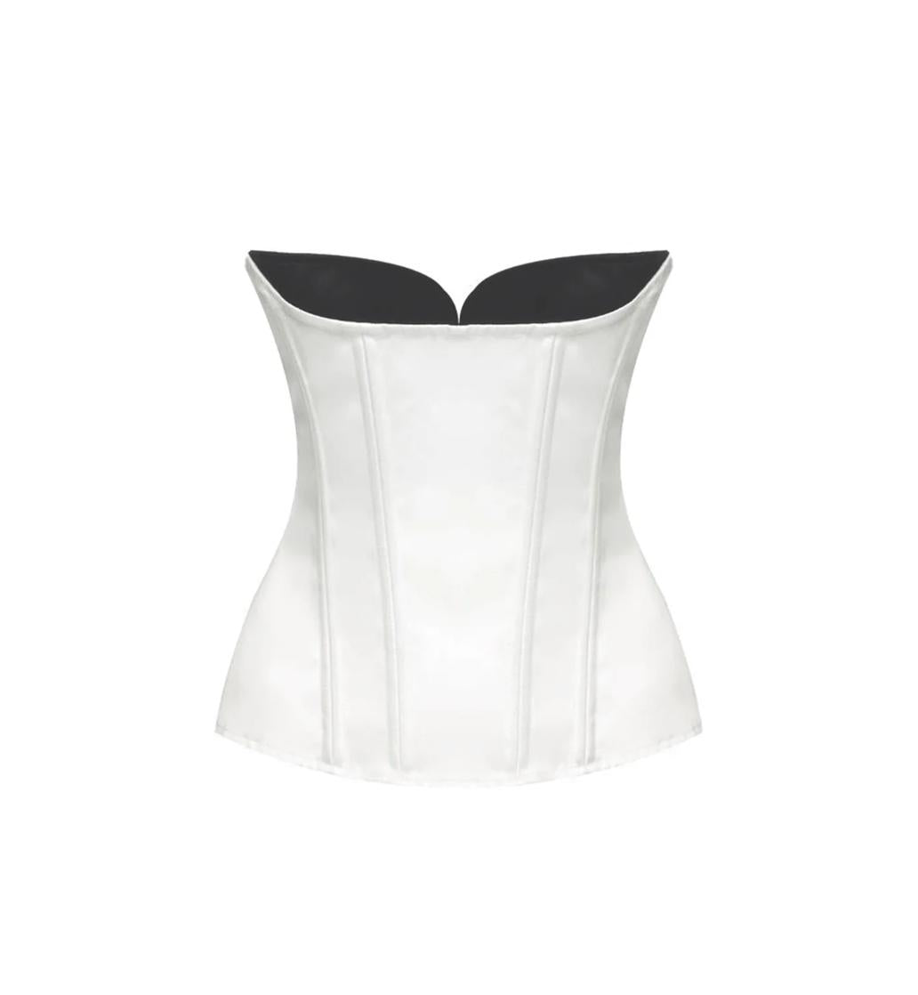 White structured crepe corset top featuring a boned bodice and contrasting black neckline inserts.