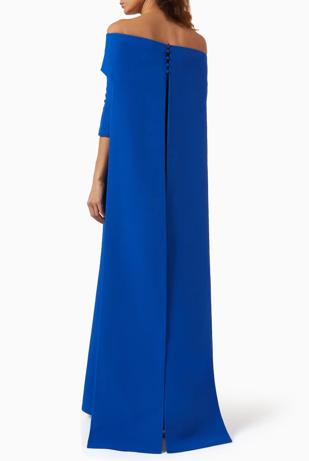 Royal blue off-the-shoulder floor-length gown with a button-back detail and smooth polyester fabric.