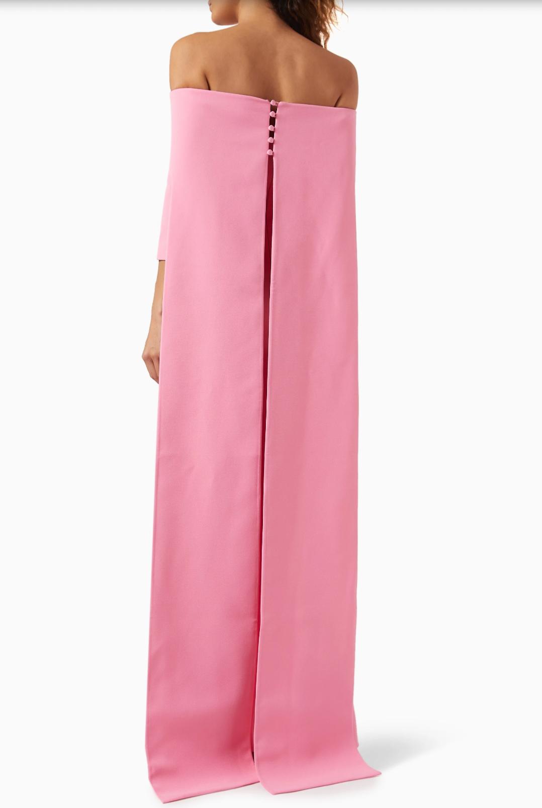 Pink off-the-shoulder floor-length gown with a button-up back detail and smooth polyester fabric.