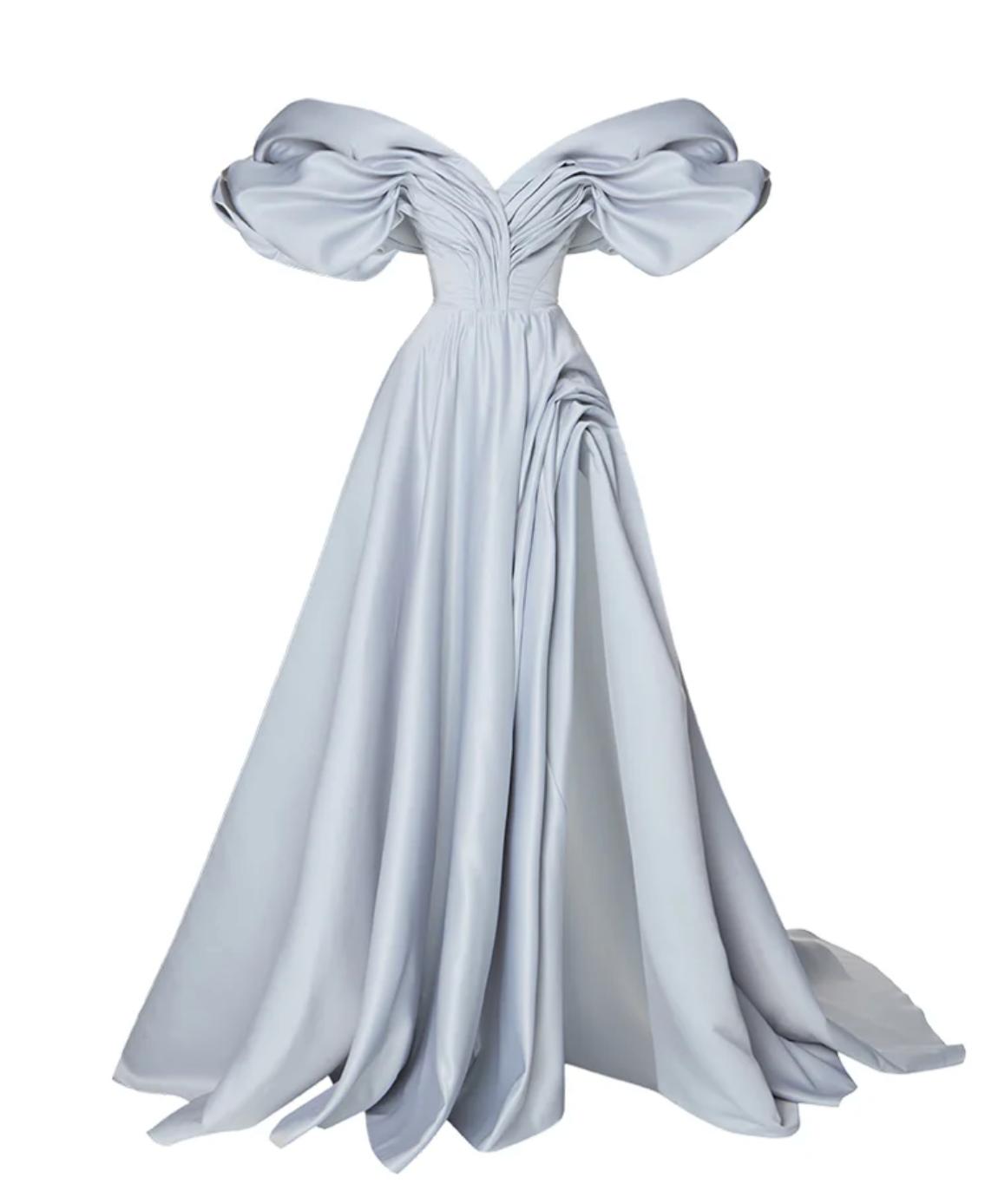 Off-shoulder silver satin A-line gown with pleated bodice, voluminous sleeves, and a high side slit.