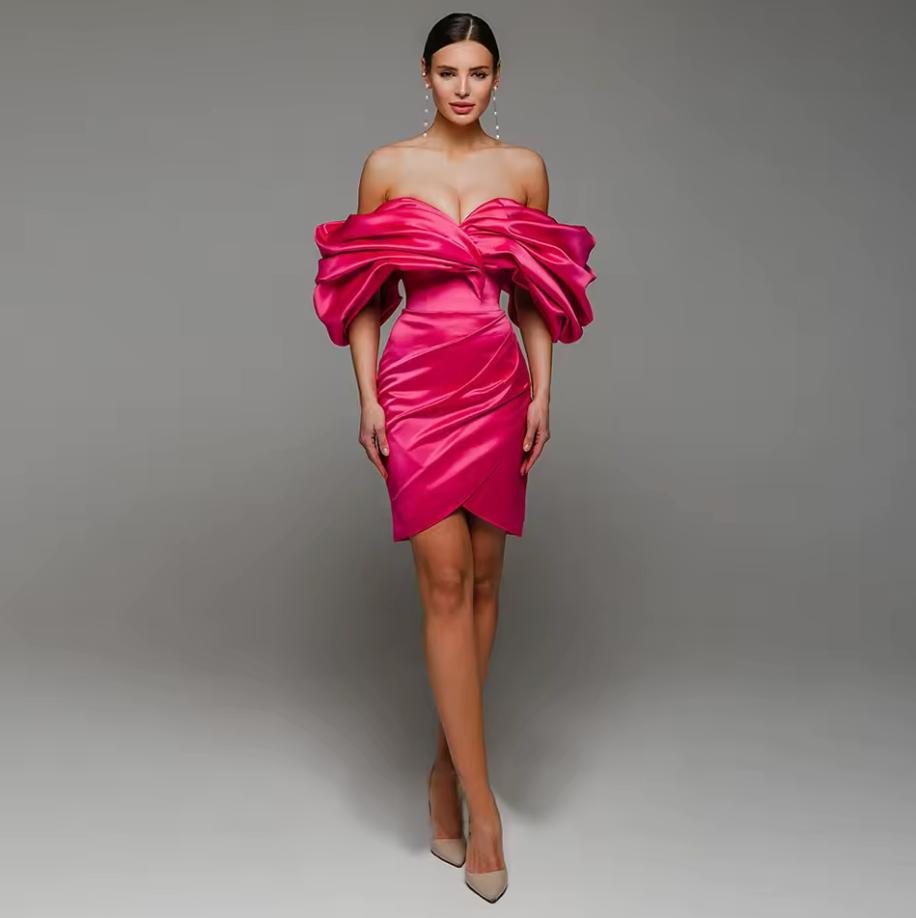 Hot pink satin mini gown with an off-shoulder sweetheart neckline, voluminous pleated sleeves, and a fitted A-line silhouette.