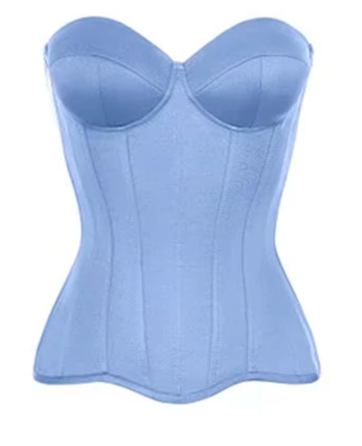 Light blue strapless Fynn corset top in a structured bandage fabric with a sleek, cropped, and cinched waist silhouette.
