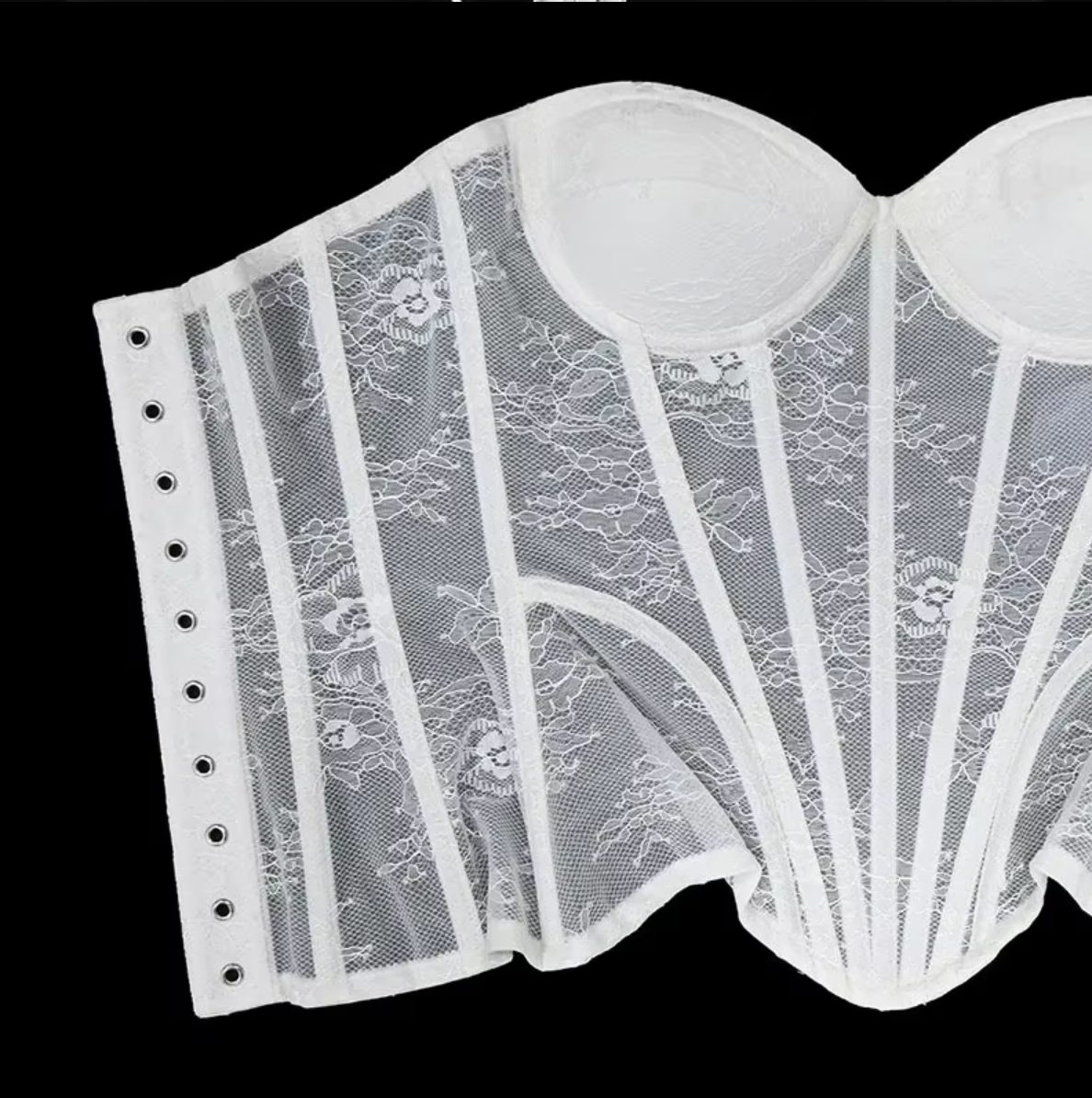 White lace corset bustier with steel-boned construction, mesh panels, and a structured sweetheart neckline.