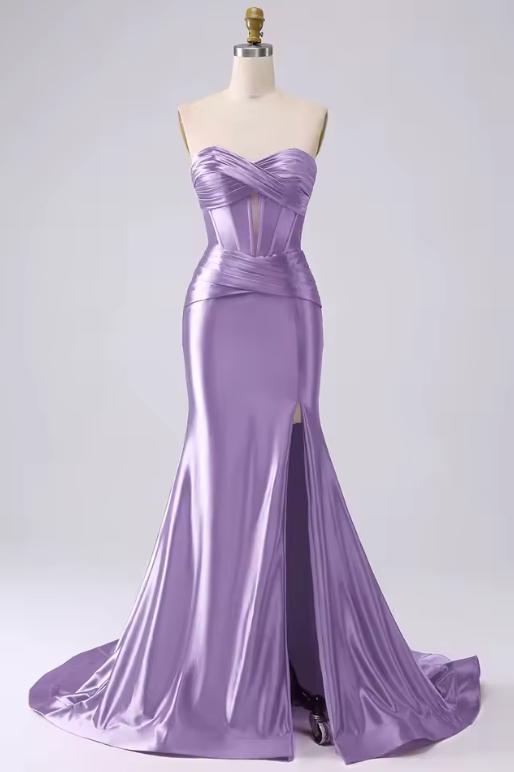 Lavender satin mermaid gown with a sweetheart corset bodice, pleated details, and a high leg slit on a mannequin.