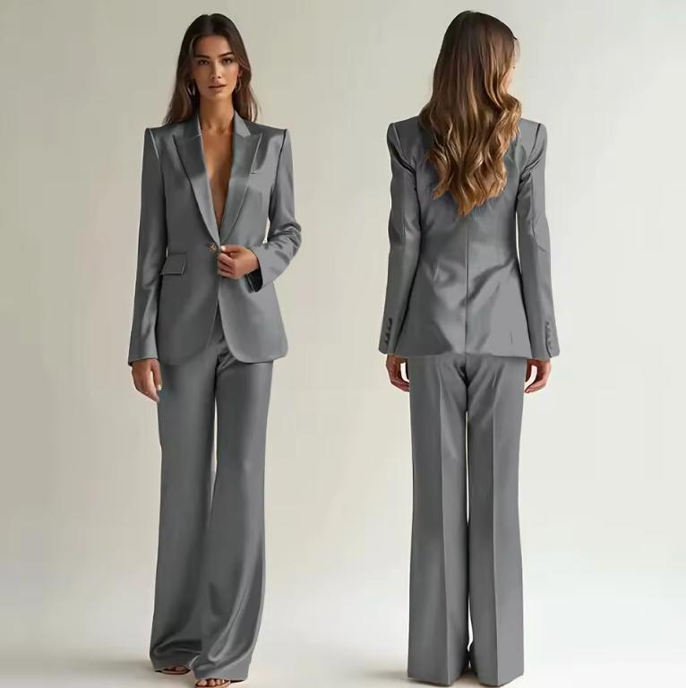 Model wearing a grey satin two-piece suit with a single-button blazer and wide-leg trousers, shown from front and back.