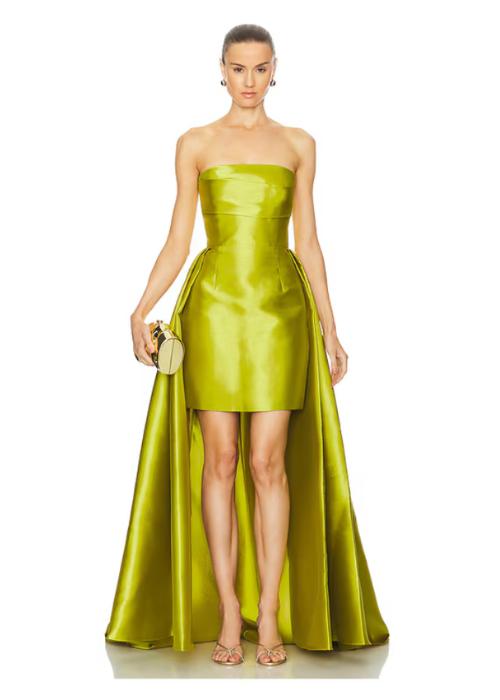 Strapless chartreuse mini dress with a structured silhouette and dramatic detachable train.