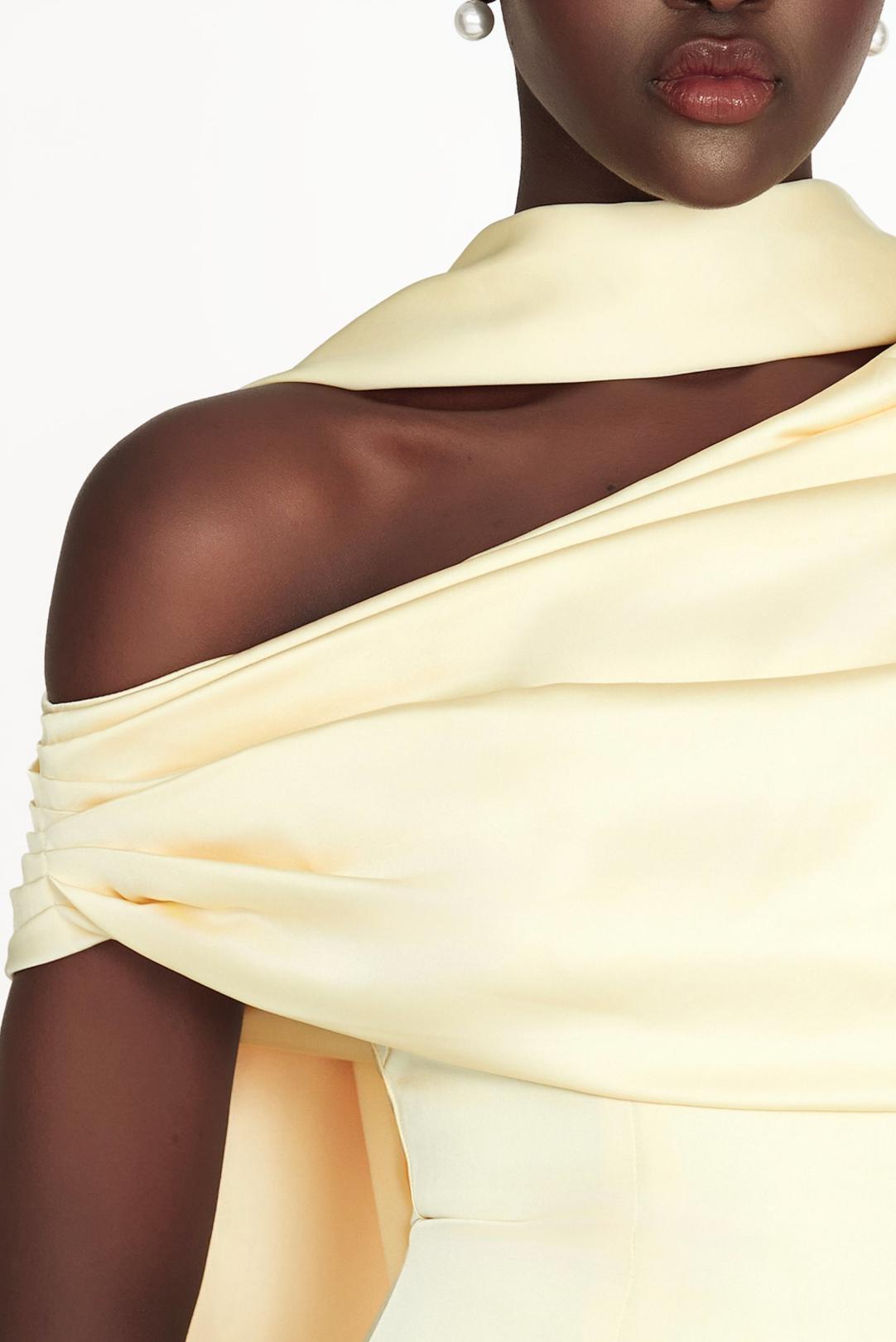 Pale yellow satin Kulture dress featuring a gathered Bardot neckline that elegantly highlights the shoulders.