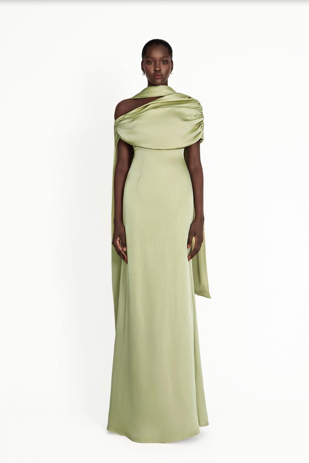 Sage green satin A-line gown featuring a gathered Bardot neckline and elegant draped shoulder detail.