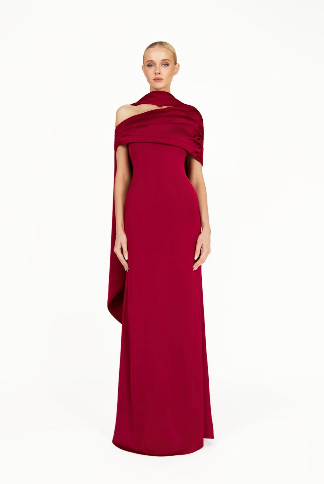 Elegant burgundy satin Kulture dress featuring a gathered Bardot neckline and a flowing A-line silhouette.