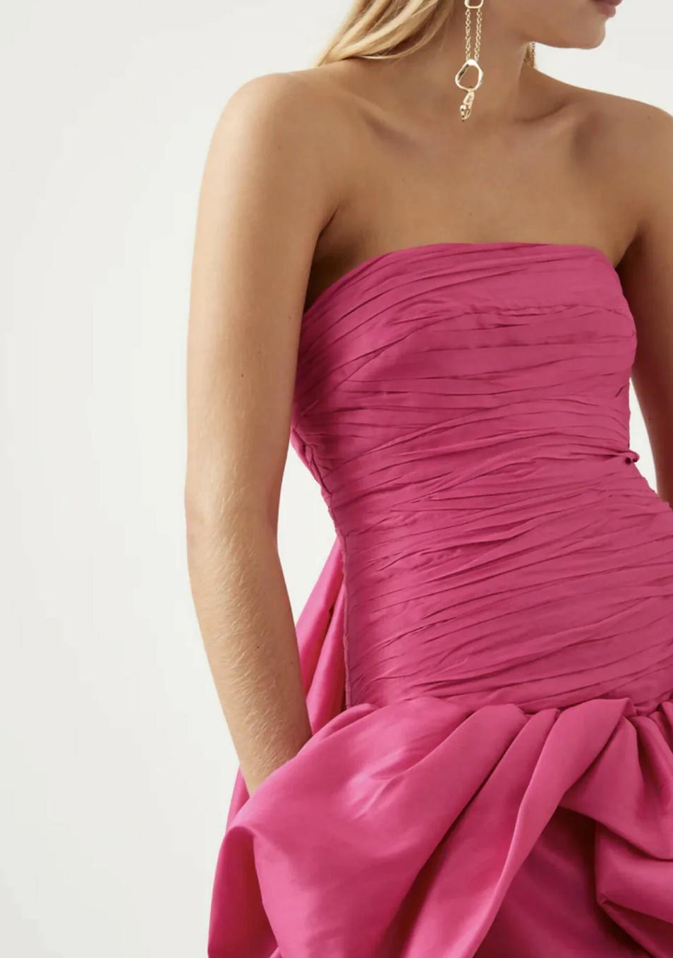 Hot pink strapless taffeta mini dress with a ruched bodice and voluminous bubble hem.