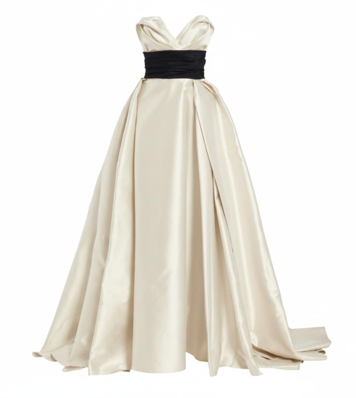 Ivory Mikado satin sleeveless gown with a sculpted sweetheart neckline and a contrasting black waist sash.