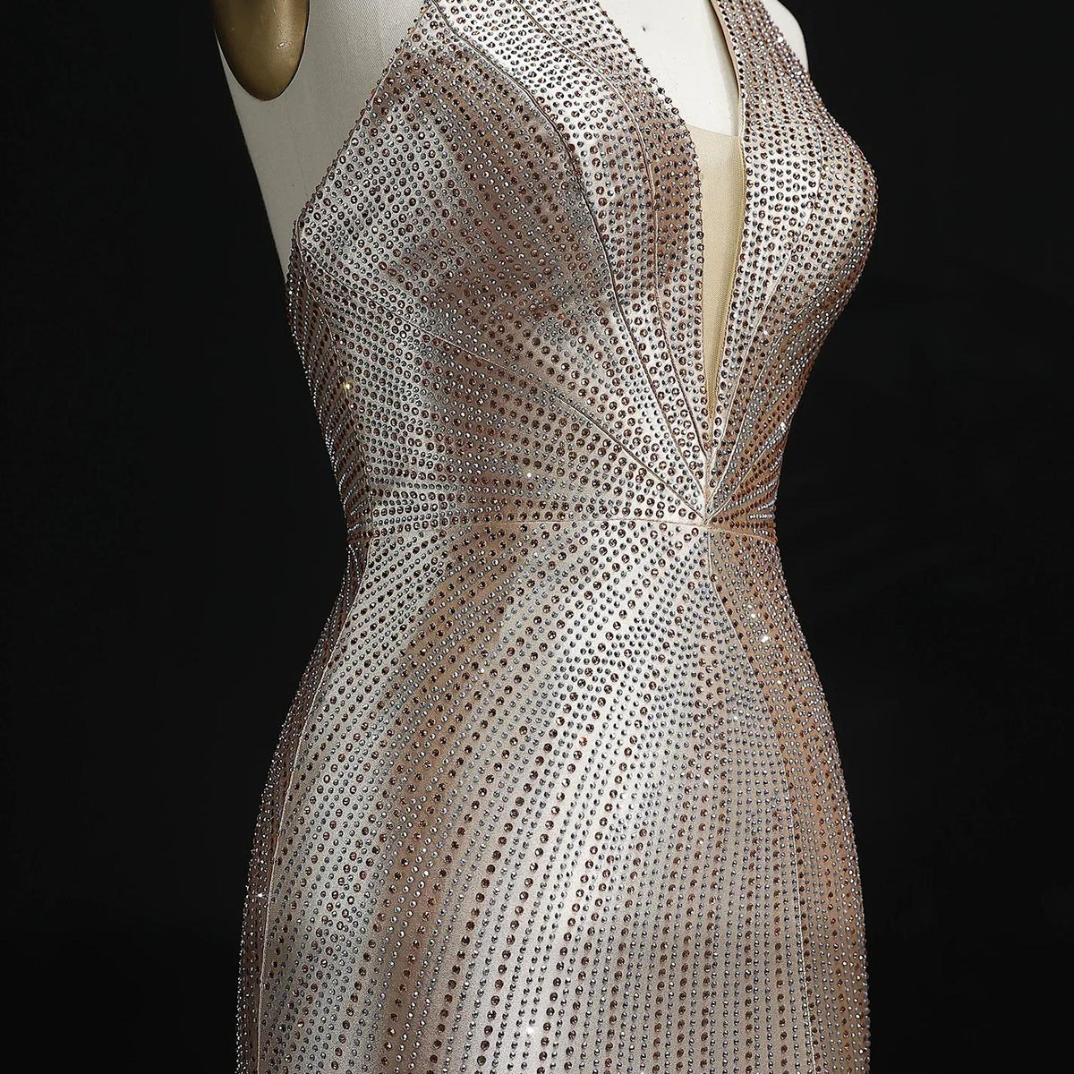 Midnight Soiree satin evening gown featuring a halter neckline and intricate sparkling crystal appliqués.
