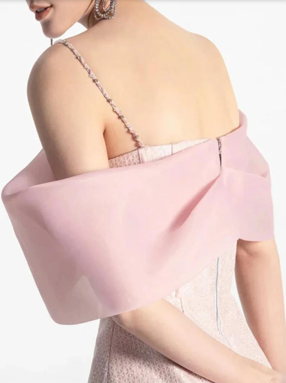 Pink satin mini dress with off-the-shoulder sheer wrap, spaghetti straps, and back zip closure.