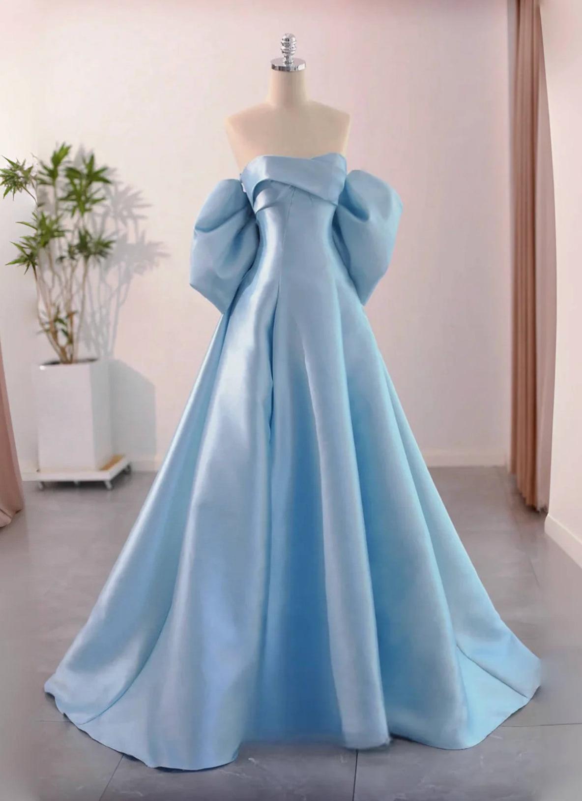 Light blue satin A-line evening gown with a strapless neckline and dramatic off-the-shoulder puff sleeves.