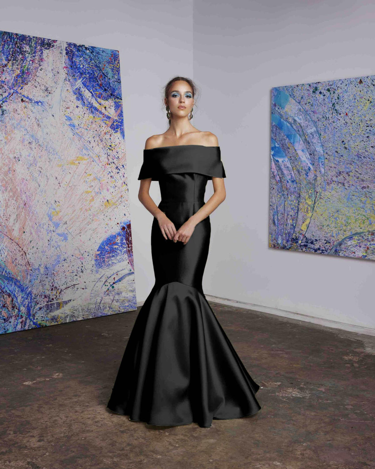Elegant black satin off-the-shoulder mermaid gown with a wide collar band for formal gala events.