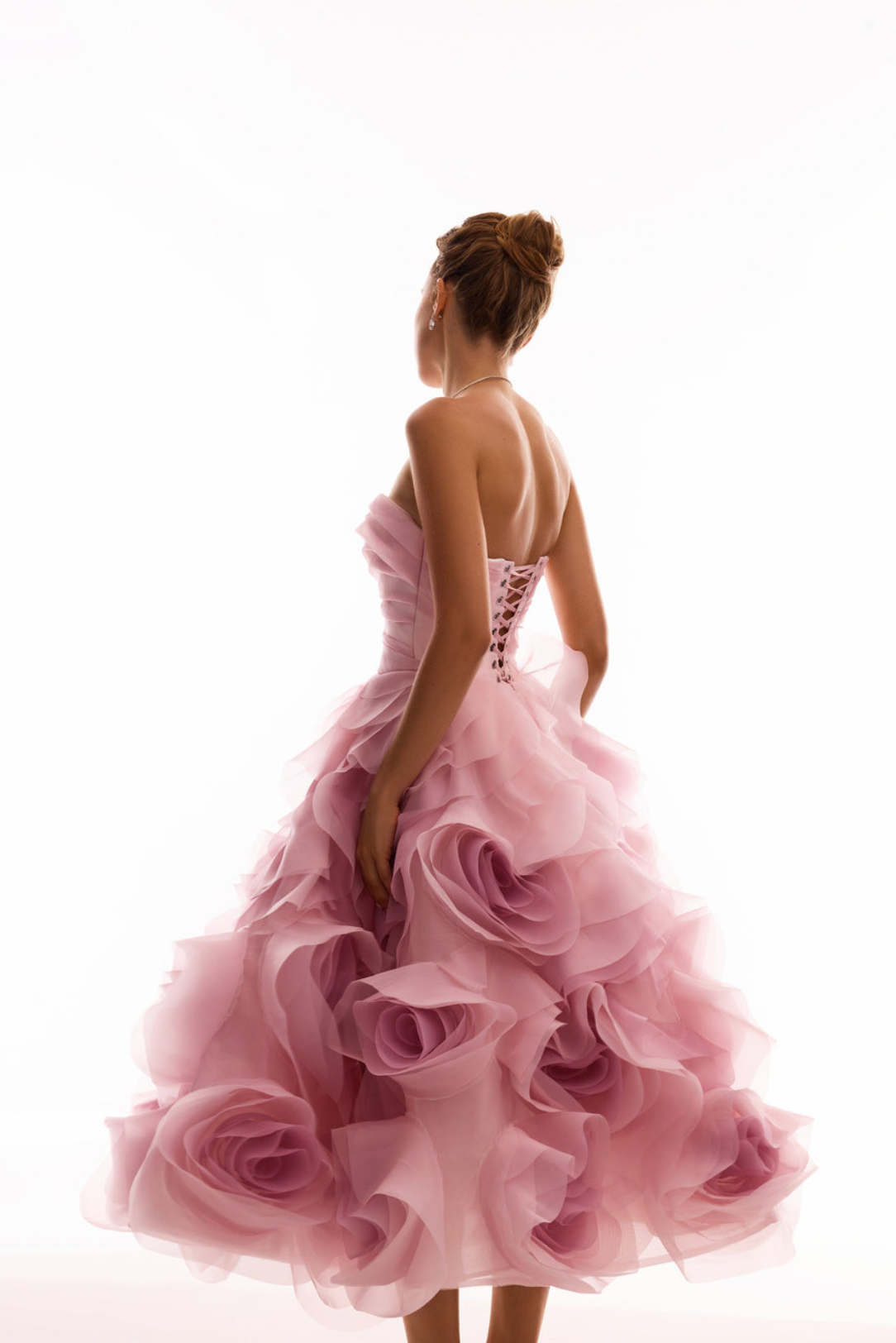 Woman wearing the Old Money Collection Couture Poppies Lane Organza Dress