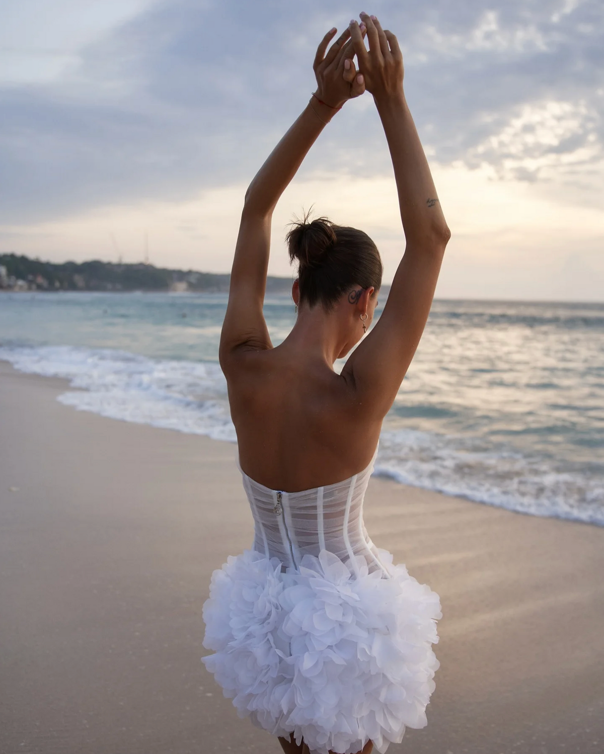 Woman wearing the Old Money Collection Couture Hilo Party Dress