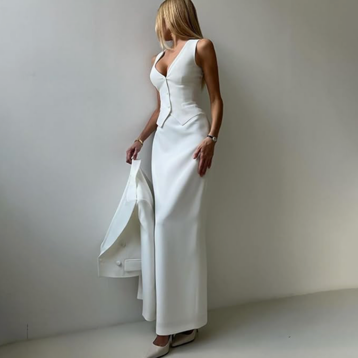 Woman wearing the Old Money Collection Couture Camarena Three Piece Skirt Set