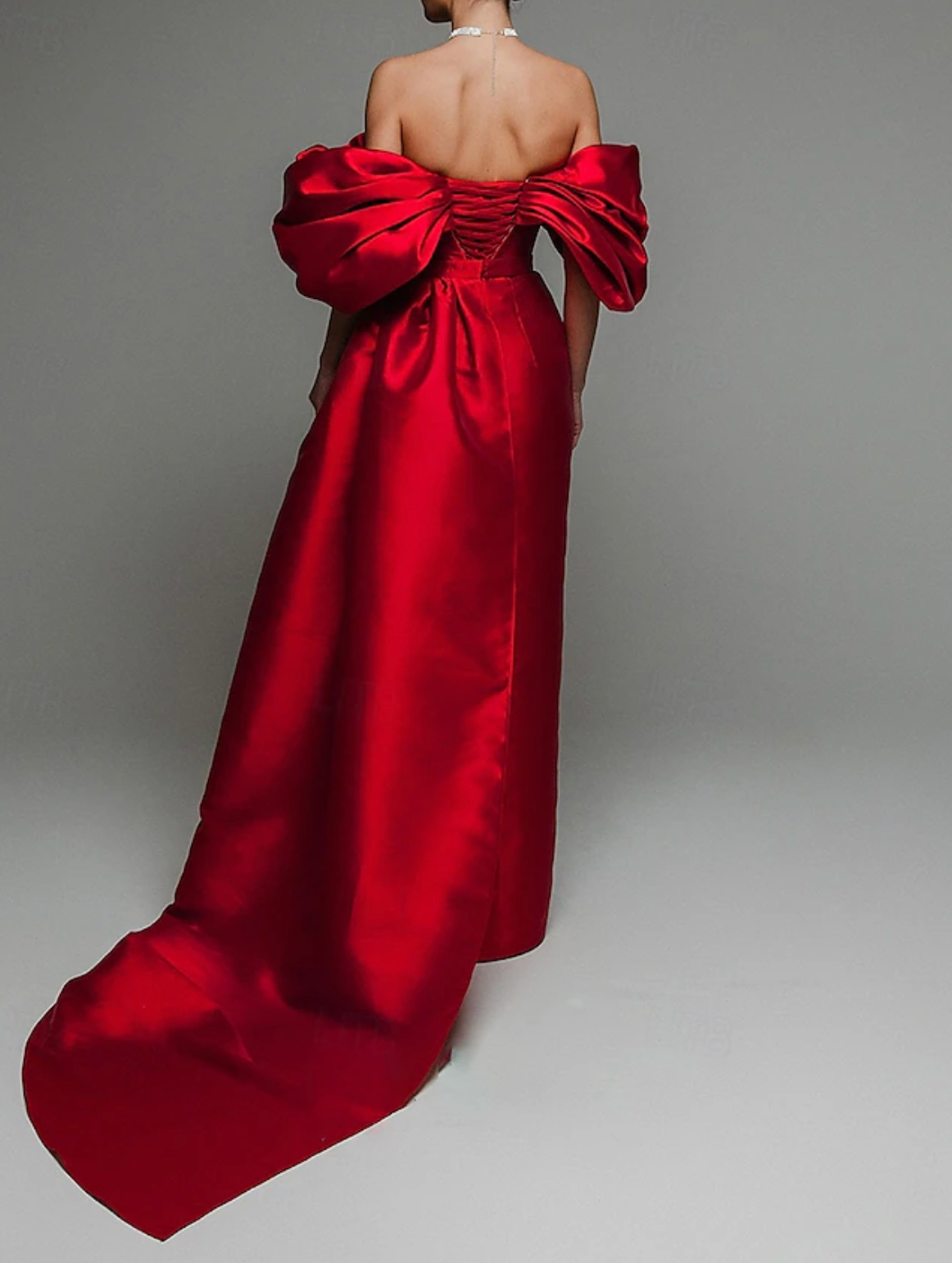 Woman wearing the Old Money Collection Couture Viceroy Bali Gown
