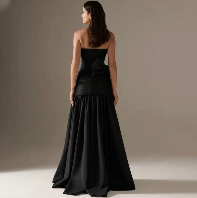 Woman wearing The Old Money Collection Couture Candelaria Gown