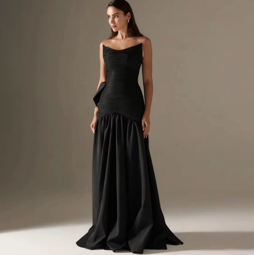 Woman wearing The Old Money Collection Couture Candelaria Gown