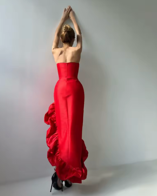 Woman wearing the Old Money Collection Couture red Herne Bay Cocktail Dress