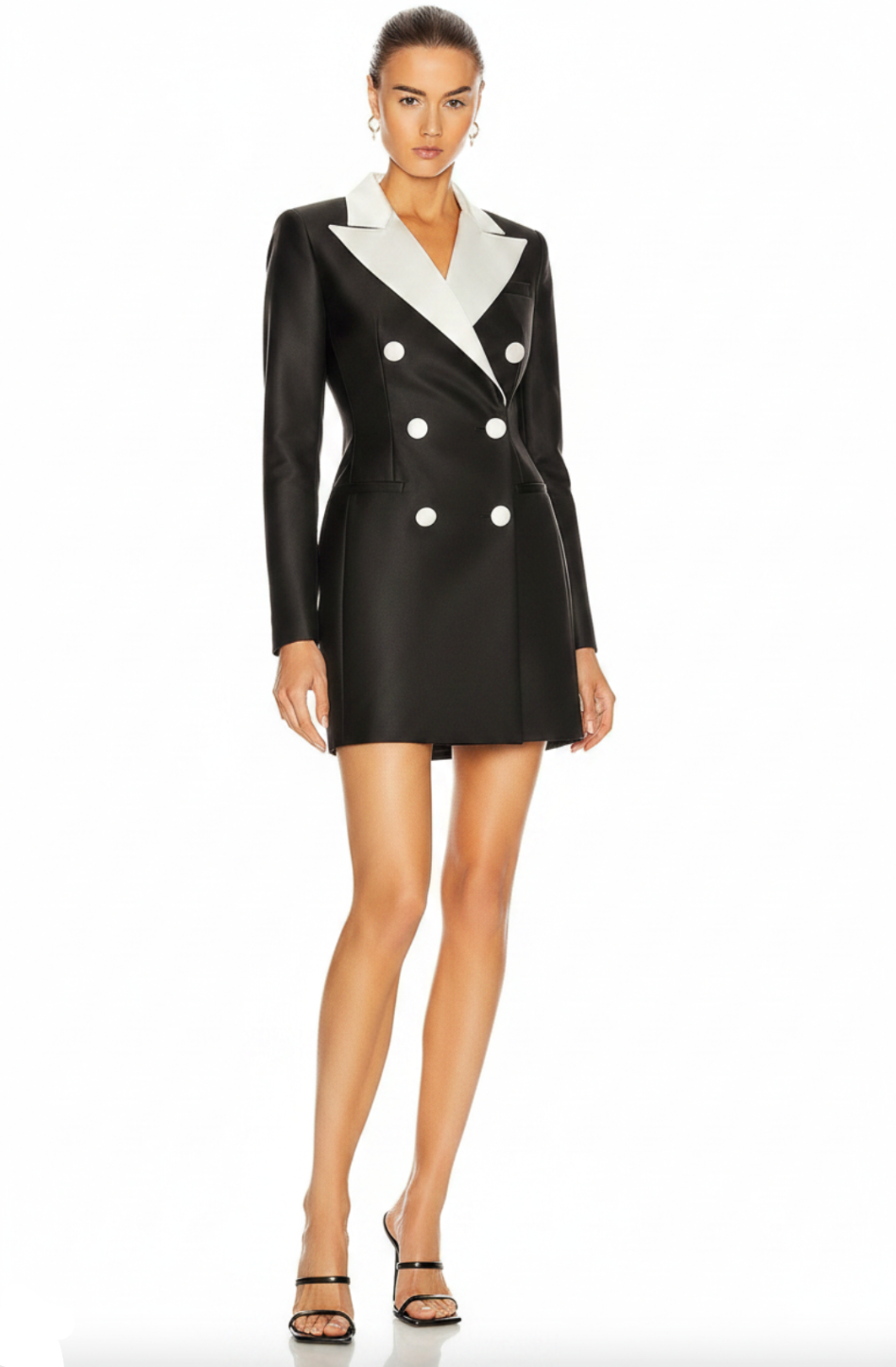 Black tuxedo mini dress with white satin lapels, double-breasted button front, and tailored silhouette.