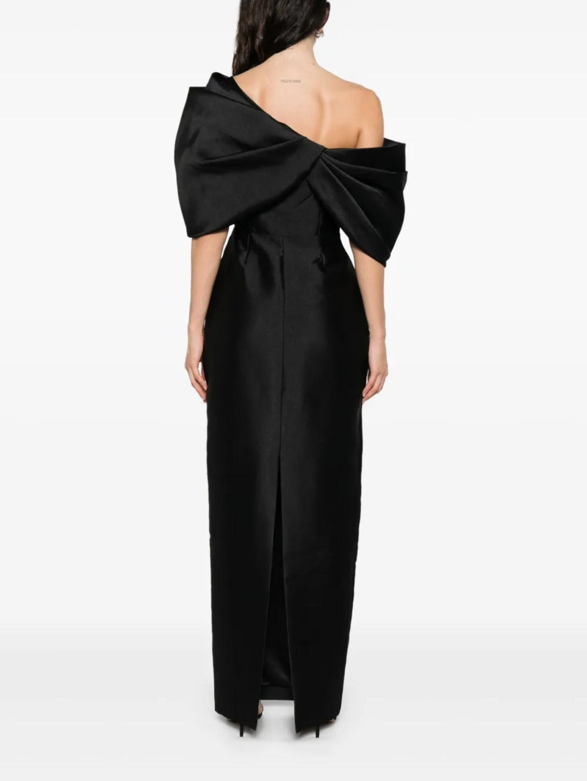 Back view of a black twill satin one-shoulder gown with an asymmetric neckline and structured architectural design.
