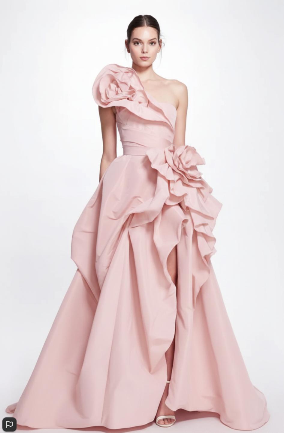 Blush pink one-shoulder taffeta A-line gown featuring dramatic 3D oversized floral embellishments and a floor-length train.