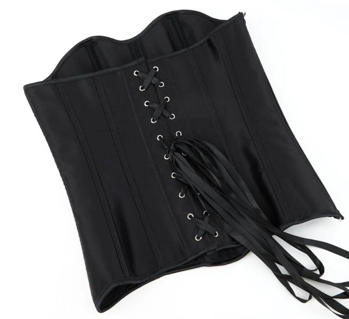 Black satin overbust corset with structured boning, silver eyelets, and long ribbon lace-up back closure.