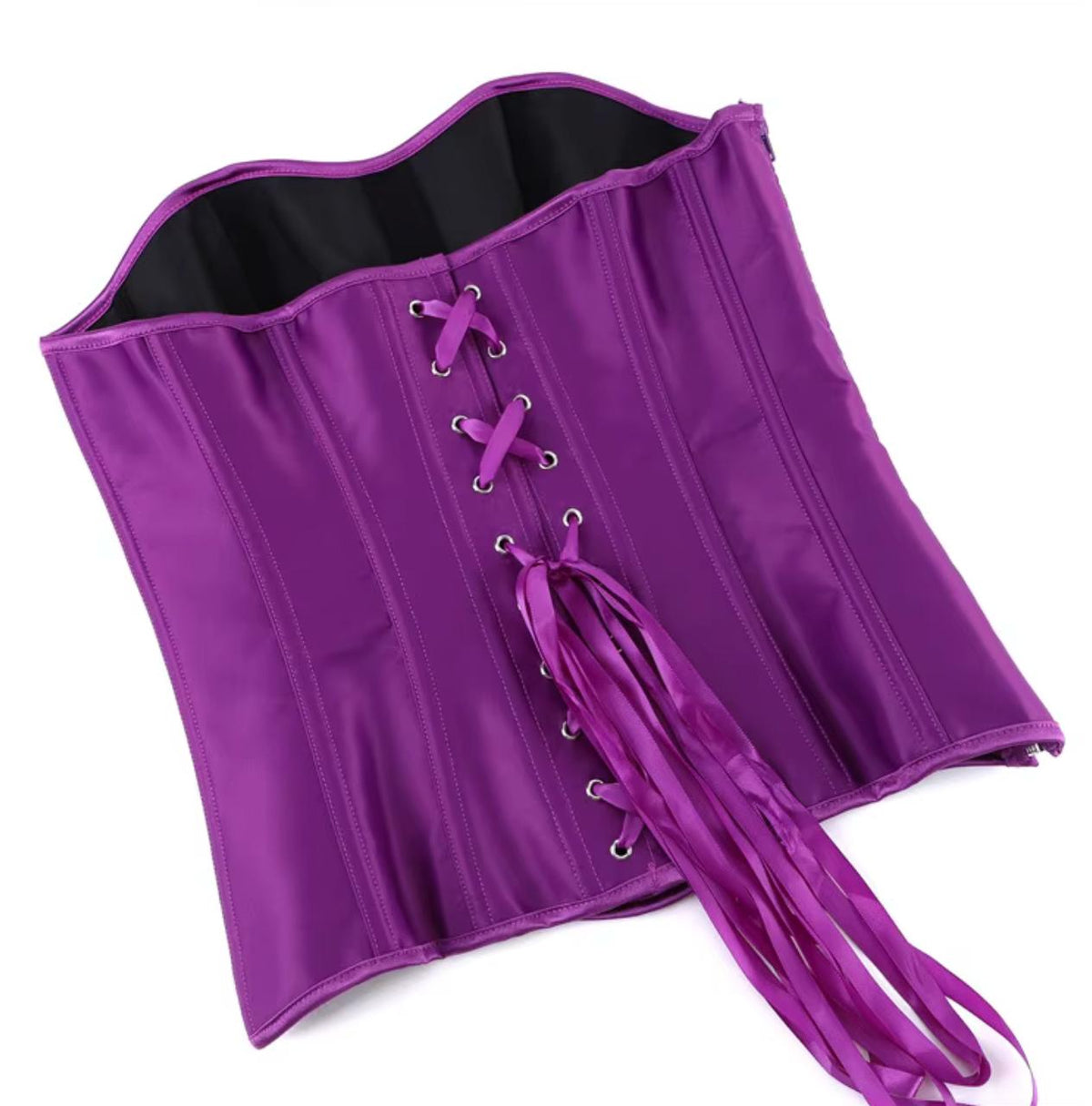 Purple satin Soli overbust corset with structured boning, metal eyelets, and long ribbon lace-up back closure.
