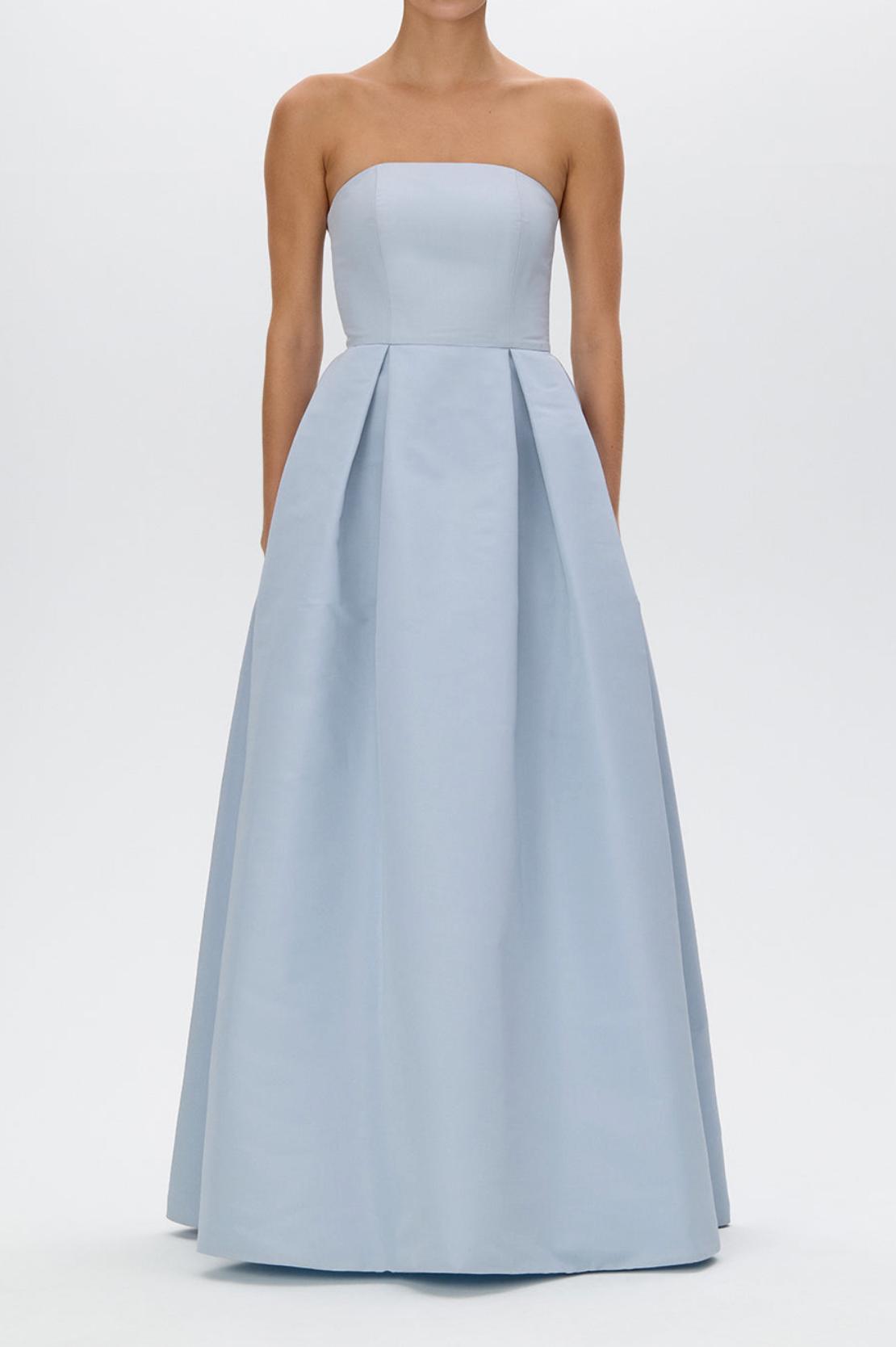 Strapless light blue satin gown with a fitted bodice and a full-length pleated skirt on a white background.