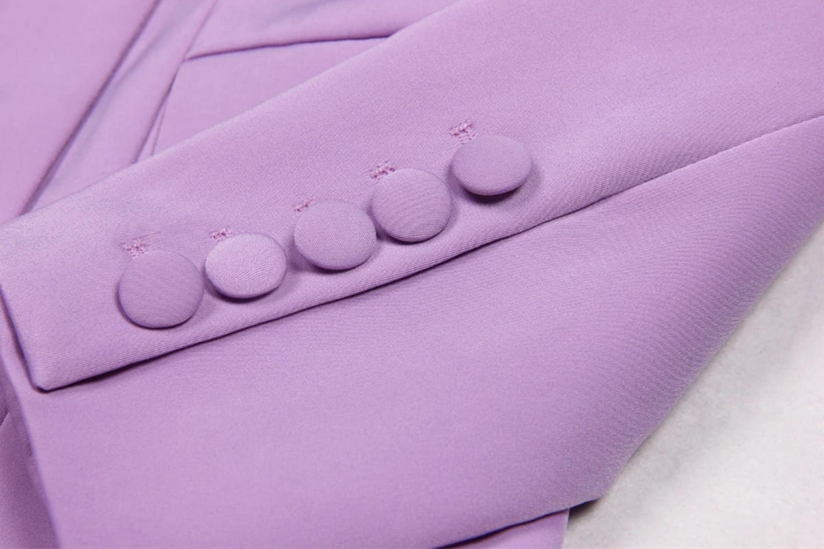 Close-up of a lavender Italian satin blazer sleeve featuring five matching fabric-covered buttons on the cuff.