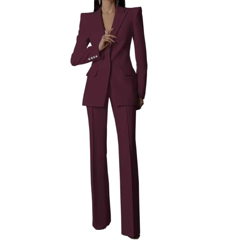 Burgundy Via Condotti suit set featuring a sharp-shouldered single-breasted blazer and tailored trousers in Italian satin.