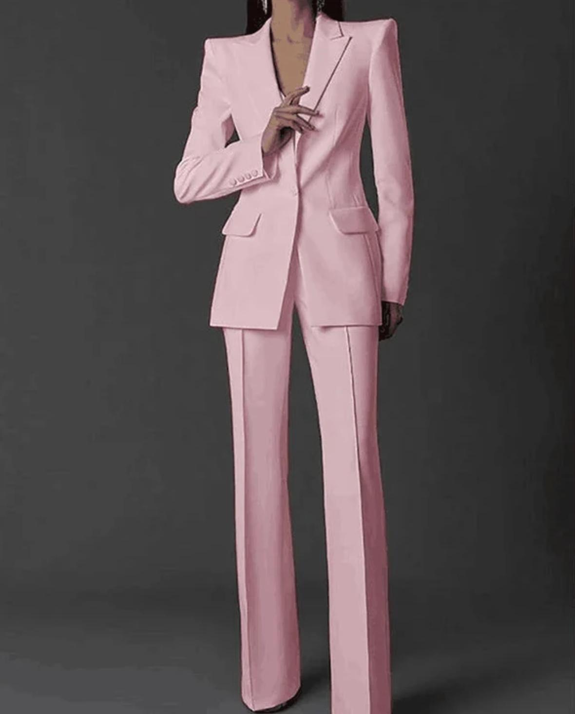 Light pink Via Condotti suit set featuring a sharp single-breasted blazer and tailored trousers in Italian satin.