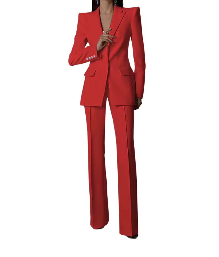 Red Via Condotti suit set featuring a sharp-shouldered single-breasted blazer and tailored trousers in Italian satin.