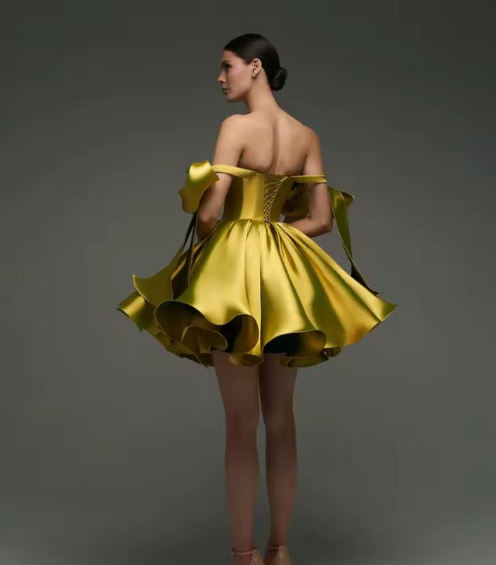 Chartreuse satin mini ball gown with off-shoulder straps, lace-up back, and voluminous flared skirt.