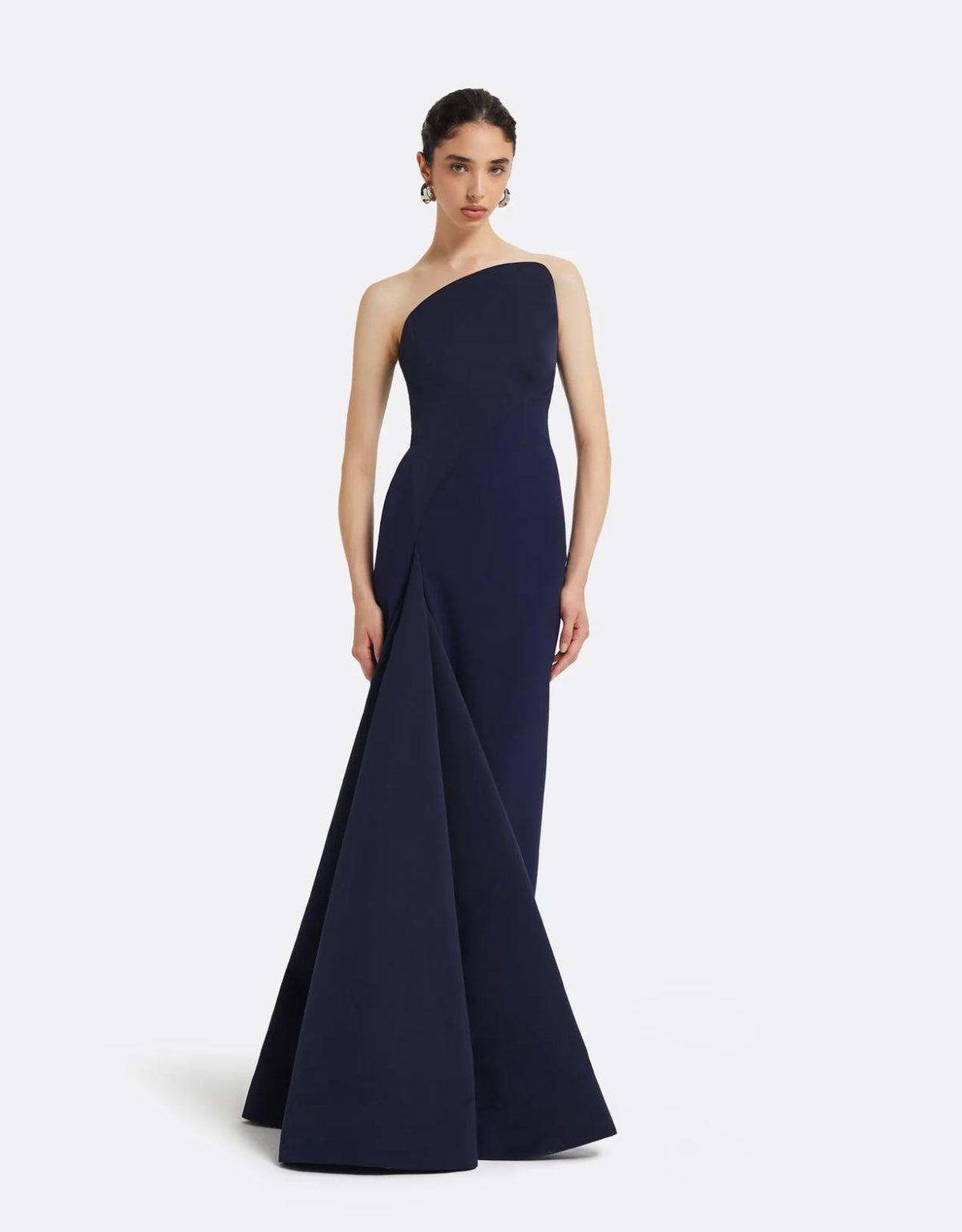 Elegant dark blue floor-length mermaid gown with a sleek off-shoulder neckline and structured taffeta silhouette.