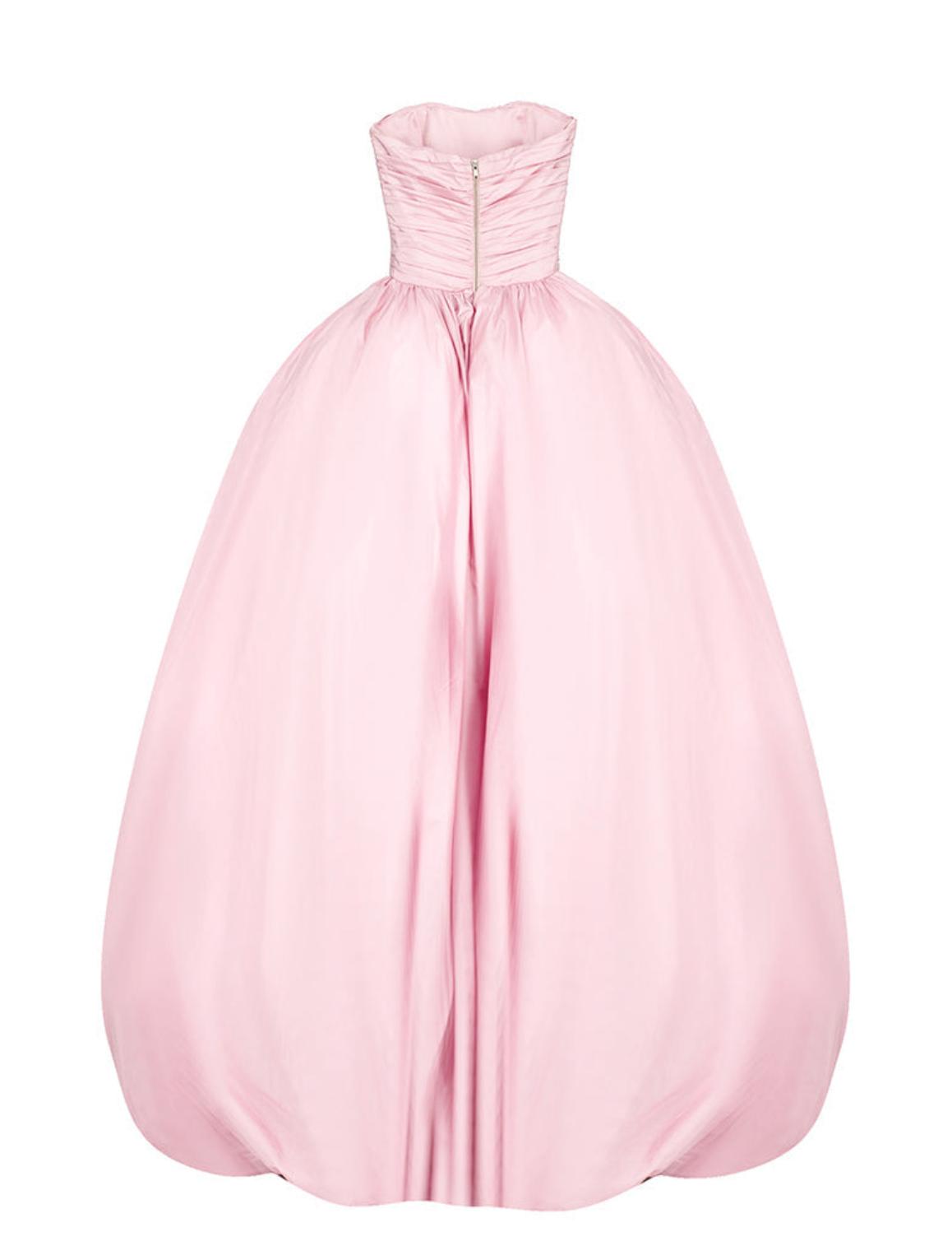 Backless pink taffeta A-line gown with a strapless, ruched bodice and a full, sweeping skirt.