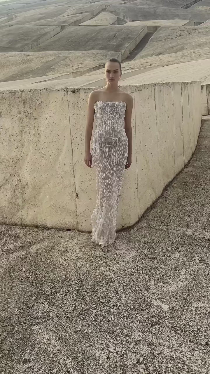 Woman wearing the Old Money Collection The Weaverly Party Dress